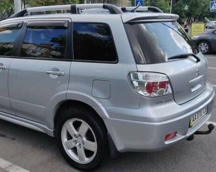 Серый Мицубиси Аутлендер, объемом двигателя 2.38 л и пробегом 323 тыс. км за 6800 $, фото 18 на Automoto.ua