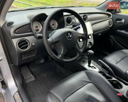 Серый Мицубиси Аутлендер, объемом двигателя 2.38 л и пробегом 170 тыс. км за 6900 $, фото 11 на Automoto.ua