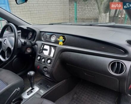 Серый Мицубиси Аутлендер, объемом двигателя 2.38 л и пробегом 143 тыс. км за 7300 $, фото 18 на Automoto.ua