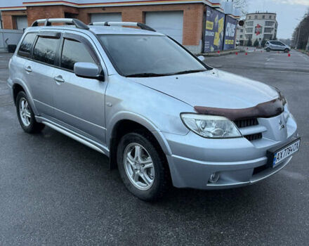 Сірий Міцубісі Аутлендер, об'ємом двигуна 2.4 л та пробігом 190 тис. км за 7500 $, фото 2 на Automoto.ua