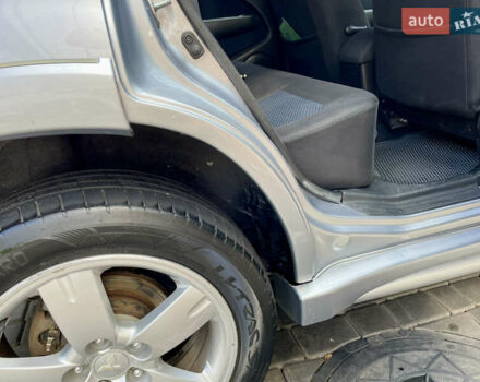 Сірий Міцубісі Аутлендер, об'ємом двигуна 2 л та пробігом 130 тис. км за 8500 $, фото 16 на Automoto.ua