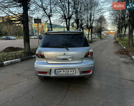 Серый Мицубиси Аутлендер, объемом двигателя 2.4 л и пробегом 320 тыс. км за 6000 $, фото 11 на Automoto.ua