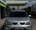 Серый Мицубиси Аутлендер, объемом двигателя 2.4 л и пробегом 327 тыс. км за 7500 $, фото 1 на Automoto.ua