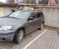 Серый Мицубиси Аутлендер, объемом двигателя 2 л и пробегом 300 тыс. км за 6000 $, фото 1 на Automoto.ua