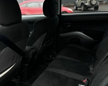 Серый Мицубиси Аутлендер, объемом двигателя 2 л и пробегом 339 тыс. км за 4949 $, фото 4 на Automoto.ua