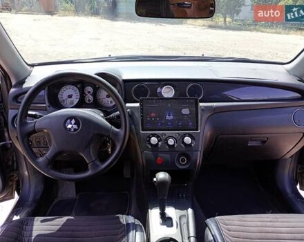 Серый Мицубиси Аутлендер, объемом двигателя 2.35 л и пробегом 342 тыс. км за 6900 $, фото 16 на Automoto.ua