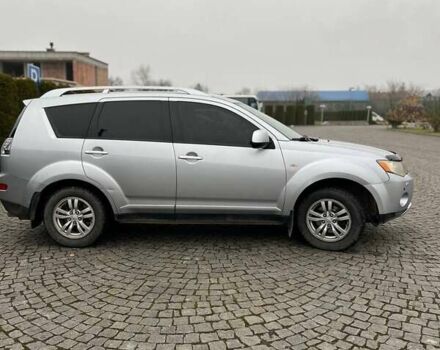 Серый Мицубиси Аутлендер, объемом двигателя 2.36 л и пробегом 285 тыс. км за 8500 $, фото 1 на Automoto.ua