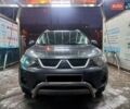 Серый Мицубиси Аутлендер, объемом двигателя 3 л и пробегом 173 тыс. км за 10000 $, фото 1 на Automoto.ua