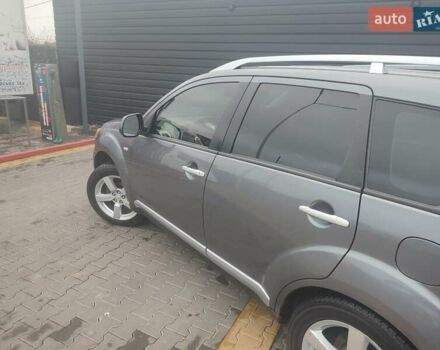Серый Мицубиси Аутлендер, объемом двигателя 2.4 л и пробегом 290 тыс. км за 8000 $, фото 3 на Automoto.ua