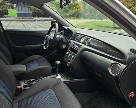 Сірий Міцубісі Аутлендер, об'ємом двигуна 2.38 л та пробігом 200 тис. км за 5600 $, фото 26 на Automoto.ua