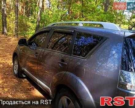 Серый Мицубиси Аутлендер, объемом двигателя 2.4 л и пробегом 223 тыс. км за 8800 $, фото 4 на Automoto.ua