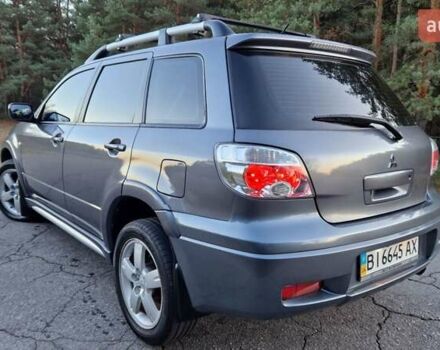 Серый Мицубиси Аутлендер, объемом двигателя 2 л и пробегом 157 тыс. км за 8300 $, фото 6 на Automoto.ua