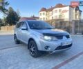 Серый Мицубиси Аутлендер, объемом двигателя 1.97 л и пробегом 245 тыс. км за 8700 $, фото 3 на Automoto.ua