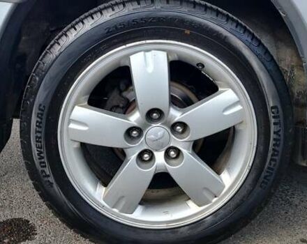 Серый Мицубиси Аутлендер, объемом двигателя 2.38 л и пробегом 323 тыс. км за 6800 $, фото 24 на Automoto.ua