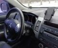 Серый Мицубиси Аутлендер, объемом двигателя 2.4 л и пробегом 244 тыс. км за 8900 $, фото 14 на Automoto.ua