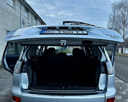 Сірий Міцубісі Аутлендер, об'ємом двигуна 2.4 л та пробігом 273 тис. км за 8400 $, фото 9 на Automoto.ua