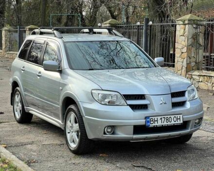 Серый Мицубиси Аутлендер, объемом двигателя 2.4 л и пробегом 170 тыс. км за 6900 $, фото 3 на Automoto.ua
