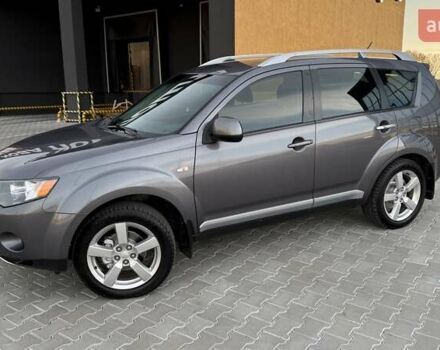 Серый Мицубиси Аутлендер, объемом двигателя 2.4 л и пробегом 174 тыс. км за 9599 $, фото 2 на Automoto.ua