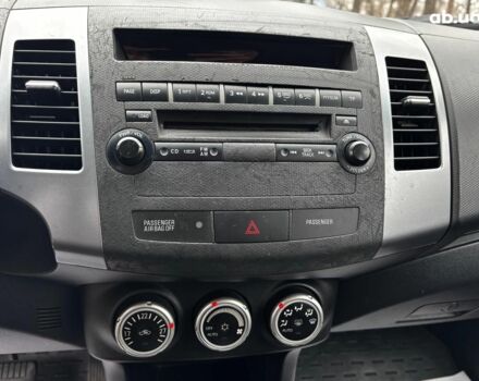 Серый Мицубиси Аутлендер, объемом двигателя 2.4 л и пробегом 237 тыс. км за 8490 $, фото 20 на Automoto.ua