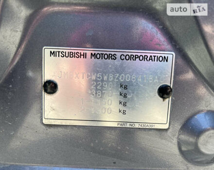Серый Мицубиси Аутлендер, объемом двигателя 2.4 л и пробегом 125 тыс. км за 8500 $, фото 5 на Automoto.ua