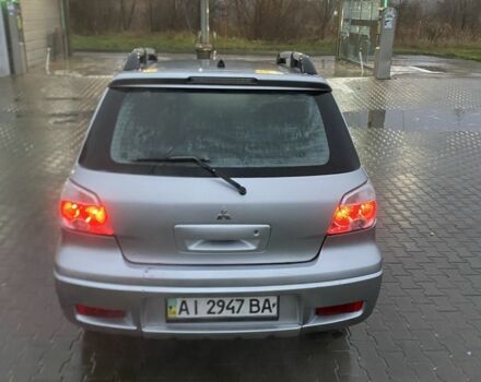 Сірий Міцубісі Аутлендер, об'ємом двигуна 2.4 л та пробігом 299 тис. км за 6300 $, фото 2 на Automoto.ua