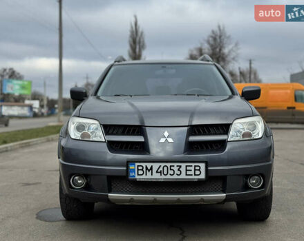 Серый Мицубиси Аутлендер, объемом двигателя 2.38 л и пробегом 254 тыс. км за 7300 $, фото 4 на Automoto.ua
