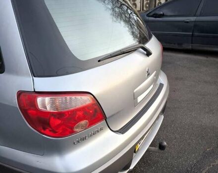 Сірий Міцубісі Аутлендер, об'ємом двигуна 2 л та пробігом 161 тис. км за 7500 $, фото 30 на Automoto.ua