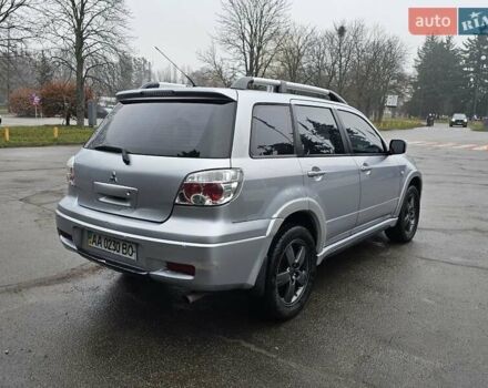 Сірий Міцубісі Аутлендер, об'ємом двигуна 2.38 л та пробігом 230 тис. км за 5700 $, фото 7 на Automoto.ua