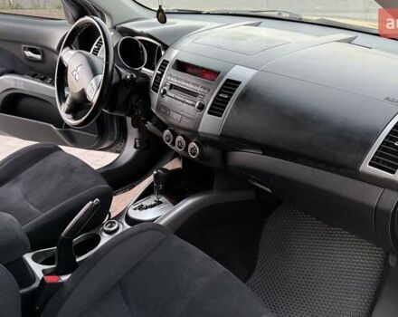 Серый Мицубиси Аутлендер, объемом двигателя 2.4 л и пробегом 174 тыс. км за 9599 $, фото 24 на Automoto.ua