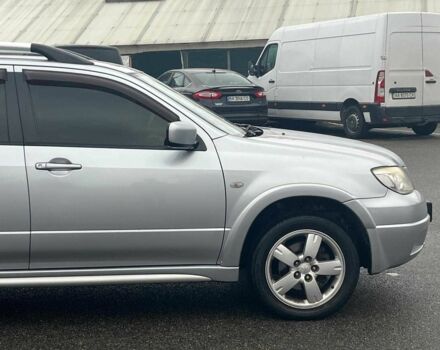 Сірий Міцубісі Аутлендер, об'ємом двигуна 2.4 л та пробігом 324 тис. км за 6890 $, фото 13 на Automoto.ua