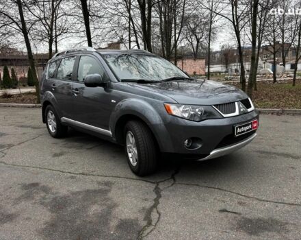 Серый Мицубиси Аутлендер, объемом двигателя 2.4 л и пробегом 237 тыс. км за 8490 $, фото 2 на Automoto.ua