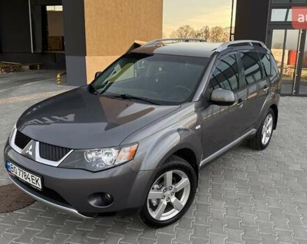 Серый Мицубиси Аутлендер, объемом двигателя 2.4 л и пробегом 174 тыс. км за 9599 $, фото 1 на Automoto.ua