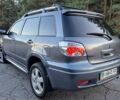 Міцубісі Аутлендер 2008 у Кременчуге на Automoto.ua Сірий Міцубісі Аутлендер, об'ємом двигуна 2 л та пробігом 157 тис. км за 8300 $, фото 3 на Automoto.ua