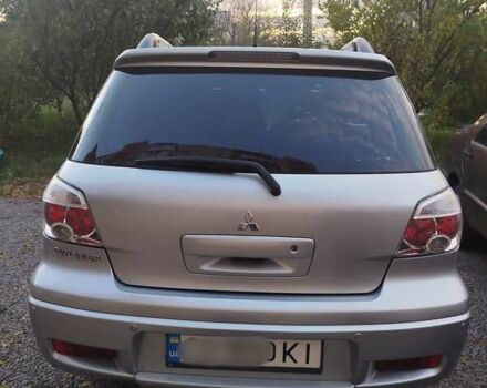 Сірий Міцубісі Аутлендер, об'ємом двигуна 2.38 л та пробігом 209 тис. км за 7460 $, фото 6 на Automoto.ua