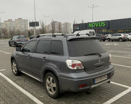 Серый Мицубиси Аутлендер, объемом двигателя 2.38 л и пробегом 227 тыс. км за 6600 $, фото 6 на Automoto.ua