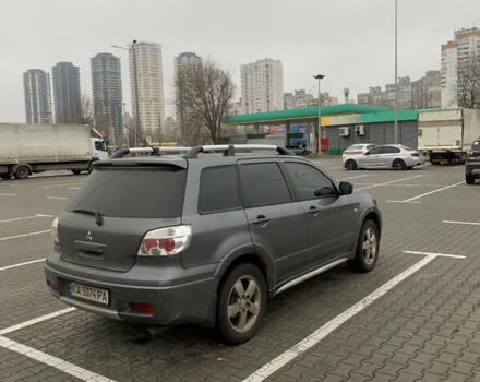 Серый Мицубиси Аутлендер, объемом двигателя 2.38 л и пробегом 227 тыс. км за 6600 $, фото 4 на Automoto.ua