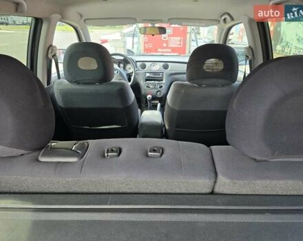 Серый Мицубиси Аутлендер, объемом двигателя 2 л и пробегом 151 тыс. км за 7500 $, фото 9 на Automoto.ua