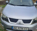 Серый Мицубиси Аутлендер, объемом двигателя 2.4 л и пробегом 120 тыс. км за 10000 $, фото 1 на Automoto.ua