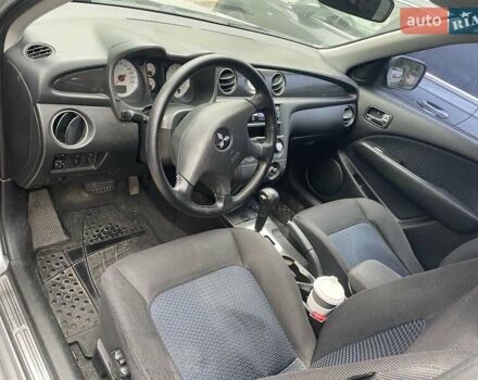 Сірий Міцубісі Аутлендер, об'ємом двигуна 2.38 л та пробігом 209 тис. км за 7460 $, фото 4 на Automoto.ua