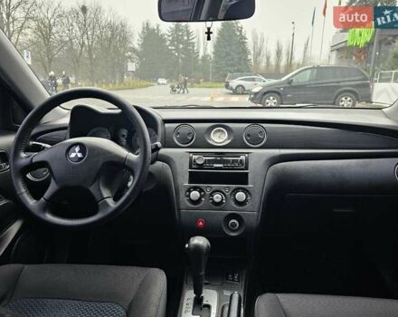 Сірий Міцубісі Аутлендер, об'ємом двигуна 2.38 л та пробігом 230 тис. км за 5700 $, фото 18 на Automoto.ua