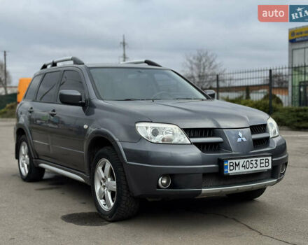 Серый Мицубиси Аутлендер, объемом двигателя 2.38 л и пробегом 254 тыс. км за 7300 $, фото 6 на Automoto.ua