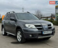 Серый Мицубиси Аутлендер, объемом двигателя 2.38 л и пробегом 254 тыс. км за 7300 $, фото 6 на Automoto.ua