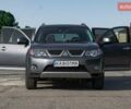 Серый Мицубиси Аутлендер, объемом двигателя 2.4 л и пробегом 280 тыс. км за 8000 $, фото 2 на Automoto.ua