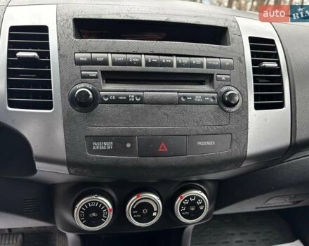 Серый Мицубиси Аутлендер, объемом двигателя 2.4 л и пробегом 237 тыс. км за 8490 $, фото 20 на Automoto.ua