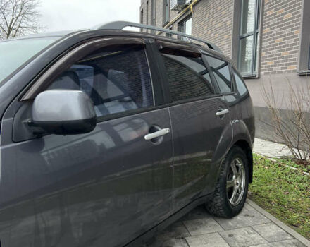 Сірий Міцубісі Аутлендер, об'ємом двигуна 3 л та пробігом 182 тис. км за 6299 $, фото 2 на Automoto.ua