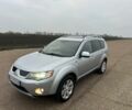 Серый Мицубиси Аутлендер, объемом двигателя 2 л и пробегом 200 тыс. км за 8300 $, фото 10 на Automoto.ua