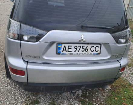 Серый Мицубиси Аутлендер, объемом двигателя 2.4 л и пробегом 120 тыс. км за 10000 $, фото 2 на Automoto.ua