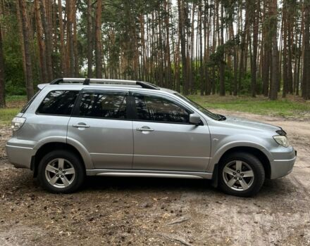 Серый Мицубиси Аутлендер, объемом двигателя 2.4 л и пробегом 225 тыс. км за 6500 $, фото 4 на Automoto.ua