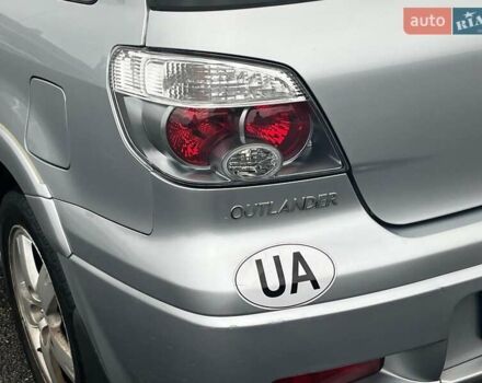 Серый Мицубиси Аутлендер, объемом двигателя 2.4 л и пробегом 324 тыс. км за 6890 $, фото 9 на Automoto.ua