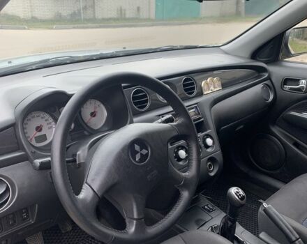 Серый Мицубиси Аутлендер, объемом двигателя 2 л и пробегом 247 тыс. км за 5999 $, фото 7 на Automoto.ua